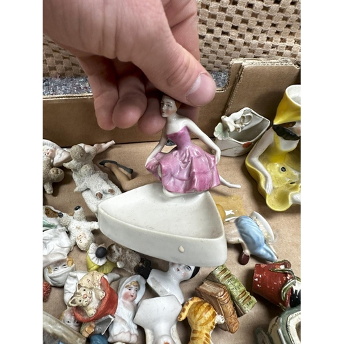 706 - Good Mixed Lot to contain a collection of Art Deco Pin Cushions, Various Miniatures, Bisque Deco Lad... 