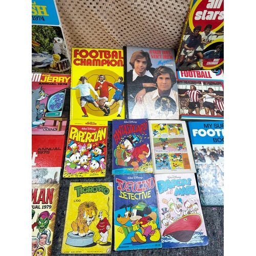 728 - A box containing various Vintage Annuals and 1970's French Disney Books Etc