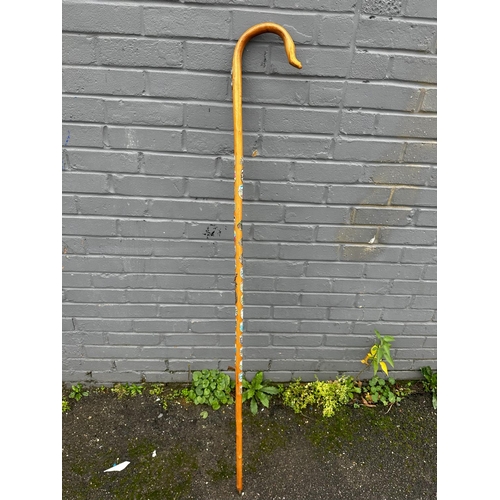 837 - Old Shepherds Crook with A quantity of Crested Badges from Various UK Towns