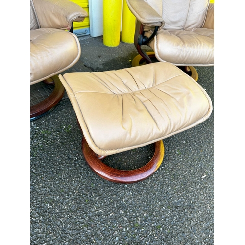 893 - A Pair of Vintage Ekornes Stressless Reclining Armchairs and Foot Stools