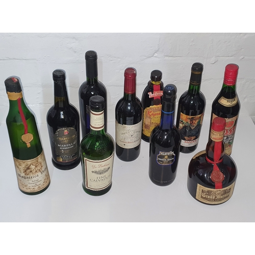 49 - Selection of unopened bottled alcohol inc vintage fine wines etc