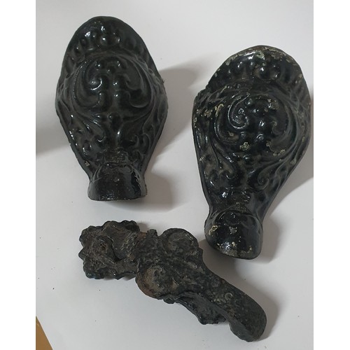 120 - Pair of cast bath legs plus a very old door knocker