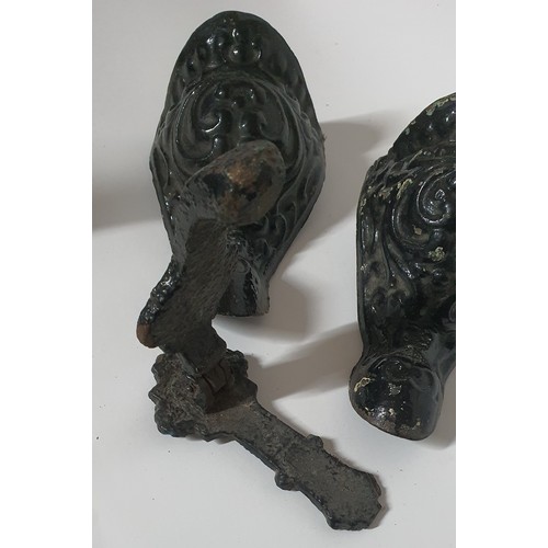 120 - Pair of cast bath legs plus a very old door knocker