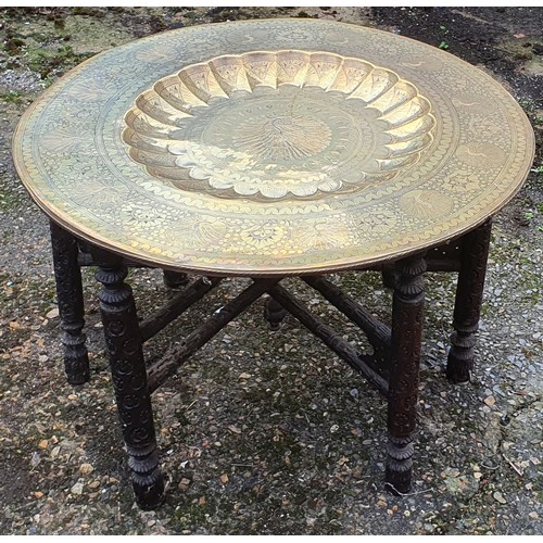 104 - Vintage folding brass plate top table with carved leg base