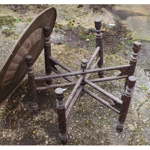 104 - Vintage folding brass plate top table with carved leg base