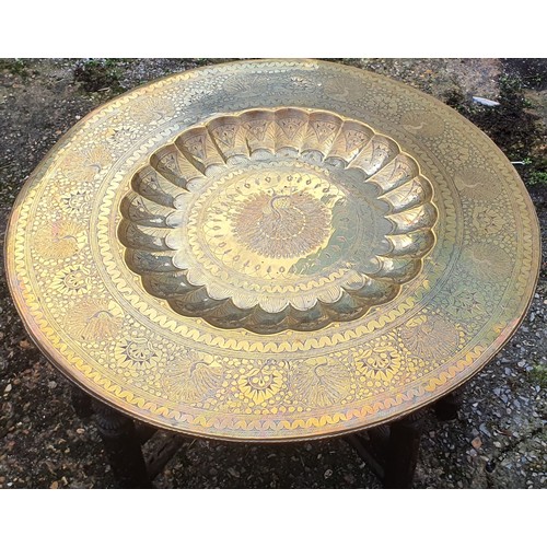 104 - Vintage folding brass plate top table with carved leg base