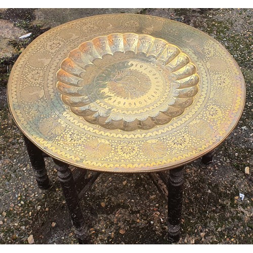 104 - Vintage folding brass plate top table with carved leg base