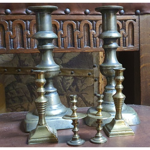 157 - Pair of vintage brass candle sticks and four smaller