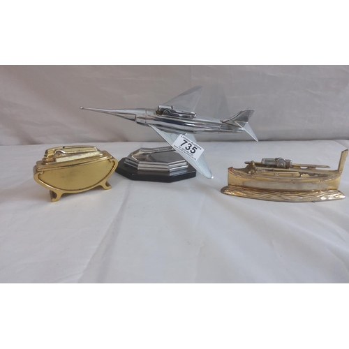 735 - Vintage Plane Form Lighter plus two other table lighters