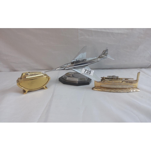 735 - Vintage Plane Form Lighter plus two other table lighters