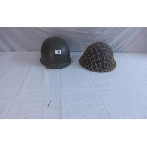 748 - WW2 Brodie Helmet with Camo net and a WW2 helmet