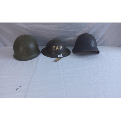 750 - Swiss WW2 M18 Helmet, American M1 Helmet and a Homefront FAP Helmet