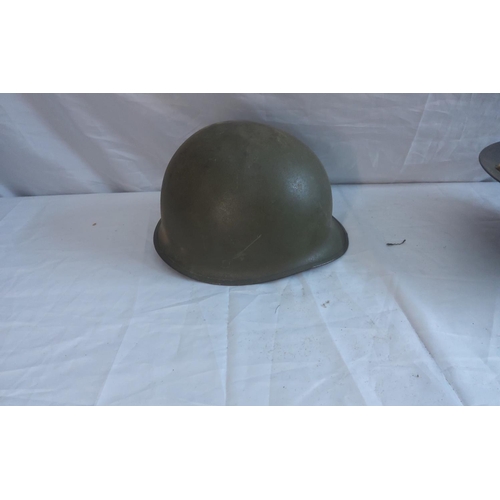 750 - Swiss WW2 M18 Helmet, American M1 Helmet and a Homefront FAP Helmet