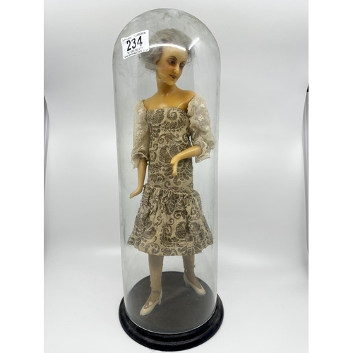 234 - Old Wax Doll on a Wooden Stand in a Glass Dome