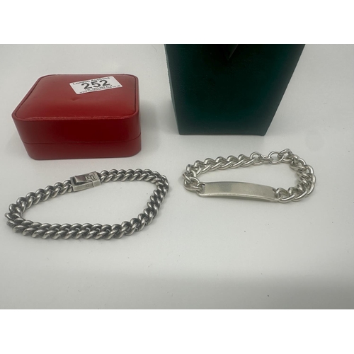 252 - Two Hallmarked Silver Identity Bracelets (110g) plus one other Silver Necklace & Pendant