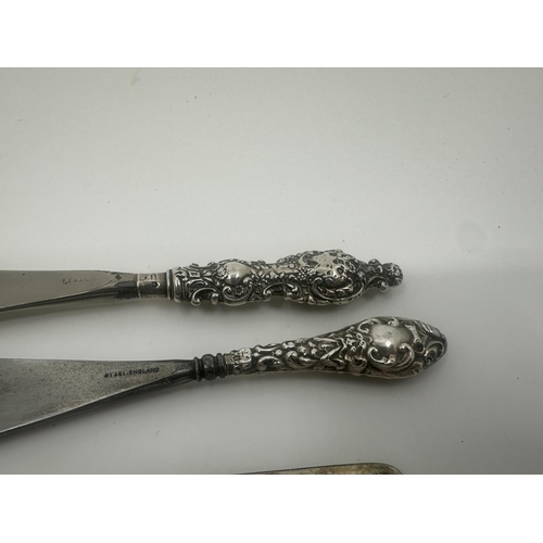 253 - Two Silver Handled Shoe Horns and a 75g Silver Clip