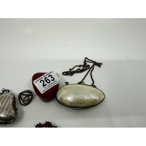 263 - Silver Ring, White Metal Putti Brooch, British Empire Exhibition Stamp Purse and a Shell Purse