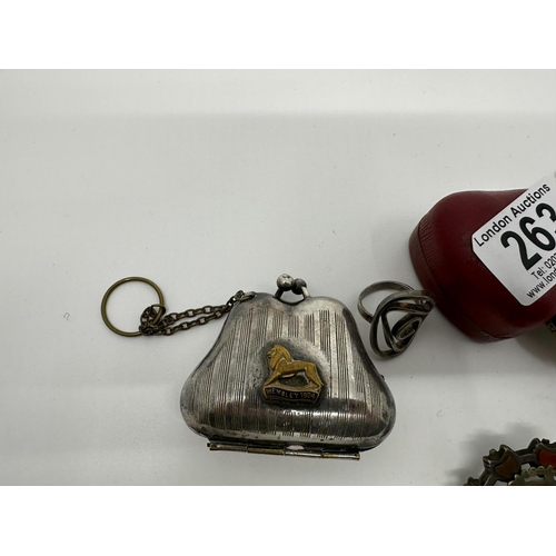 263 - Silver Ring, White Metal Putti Brooch, British Empire Exhibition Stamp Purse and a Shell Purse