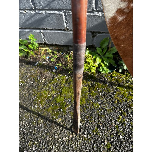 241 - Two 19th Century Zulu Cow Skin Shield (72cm x 43cm), Zulu Staff (165cm) and Zulu Spear (153cm)