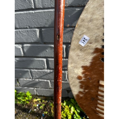 241 - Two 19th Century Zulu Cow Skin Shield (72cm x 43cm), Zulu Staff (165cm) and Zulu Spear (153cm)