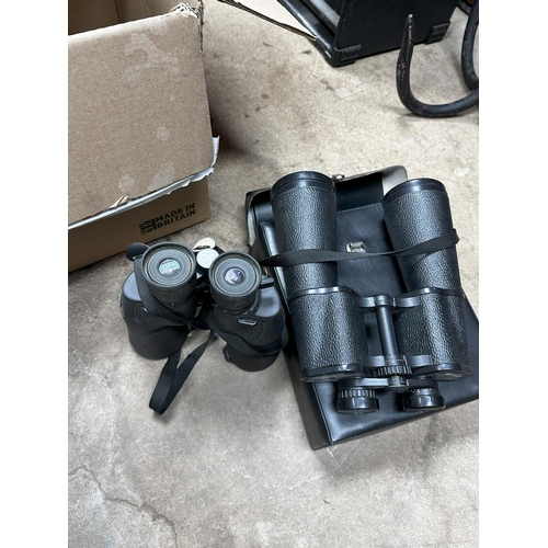 1342 - Pair of Kronos 20x60 binoculars in a case and a Pair of Nikon Aculon A211 Binoculars