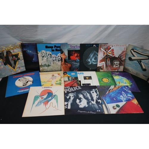 348 - Mixed lot of Vinyl Records to include Elton John, dire straits, deep purple, The police and others m... 