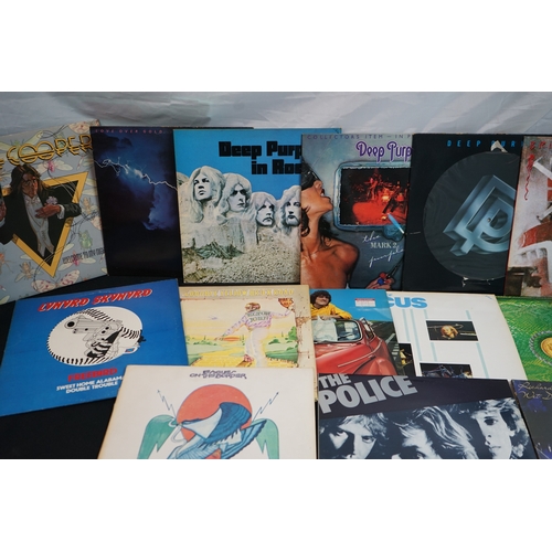 348 - Mixed lot of Vinyl Records to include Elton John, dire straits, deep purple, The police and others m... 