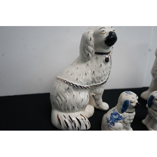 365 - Pair of white early 20th Century Ceramic Staffordshire Spaniels to  along with two others