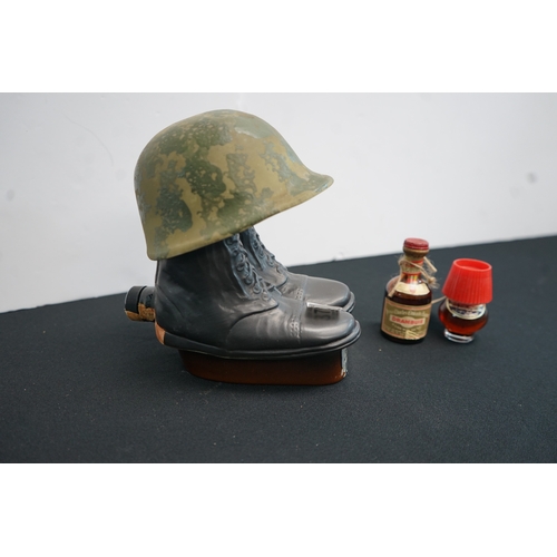 375 - 1970s Jim Beam 100 Months Old Boots & Helmet Decanter plus two miniatures