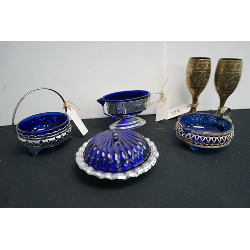 376 - Vintage Cobalt blue glass items along with two brass decorative goblets.