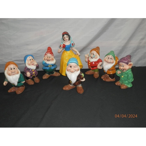 123 - A set of Disney Japan Snow White and the Seven Dwarfs figures