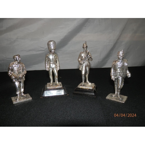 153 - Four Pewter Military Figurines