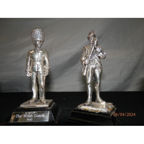 153 - Four Pewter Military Figurines