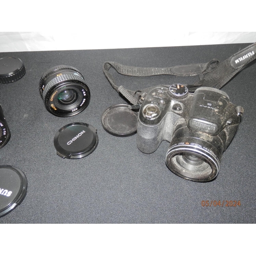 261 - Pair of Taylor Hobson Binoculars in original Case, Fujifilm Camera and a Sunagor Lens