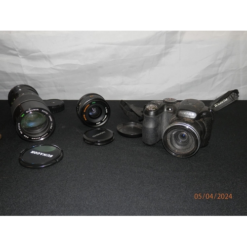 261 - Pair of Taylor Hobson Binoculars in original Case, Fujifilm Camera and a Sunagor Lens