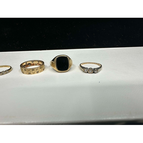 1218 - Lot of 9ct Gold Rings to include Platinum Set Diamond Trilogy Ring (Total Weight 15.54g)