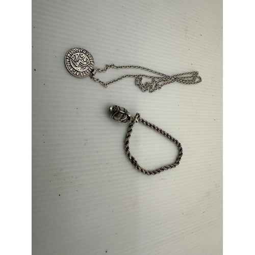 4B - Tested Silver Norse Pendant on a Silver chain and a Silver Pendant on a Metal Chain