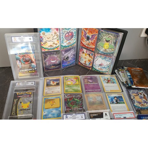 6 - Lot of 2x albums of Pokemon Cards, various graded cards, unopened packs, vintage cards etc.