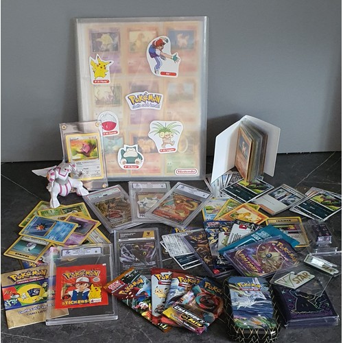 9 - Album containing approx 100 Pokemon Cards, Various graded cards and unopened packs etc.