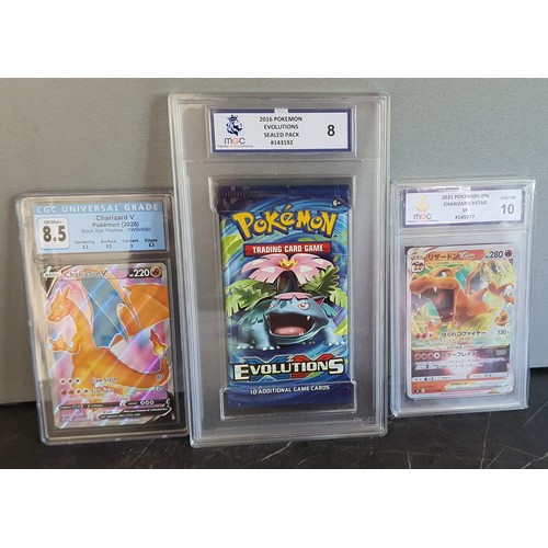 12 - 2x Graded Charizard Pokemon cards and 1x Grades Evolutions pack