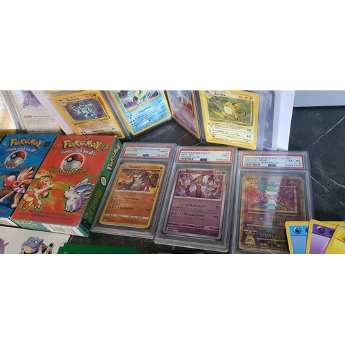 2 - Selection of Pokemon cards to include album of vintage base set cards, unopened packs, graded cards,... 