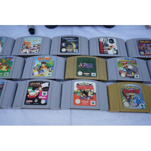 239 - A Vintage Nintendo 64 Games Console, 2 Controllers and a Selection of 26 Various Games