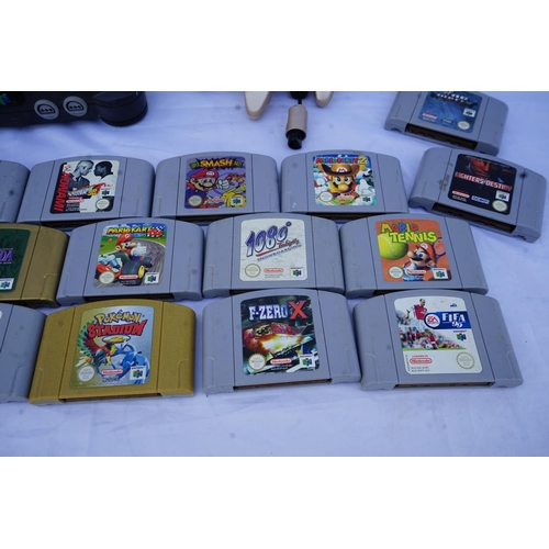 239 - A Vintage Nintendo 64 Games Console, 2 Controllers and a Selection of 26 Various Games