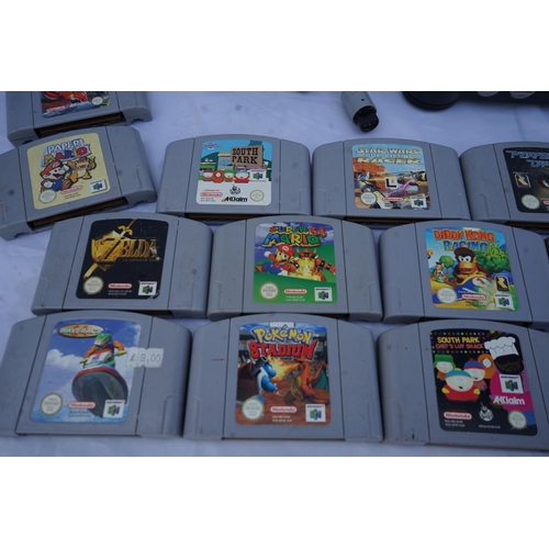 239 - A Vintage Nintendo 64 Games Console, 2 Controllers and a Selection of 26 Various Games