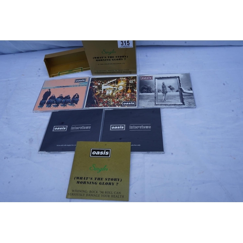 315 - Original Oasis Singles Boxset: Whats the Story Morning Glory 1996