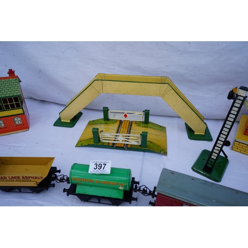 397 - Hornby: A collection of O Gauge Trains and Scenery Items . Each Piece is Individually Boxed in its o... 