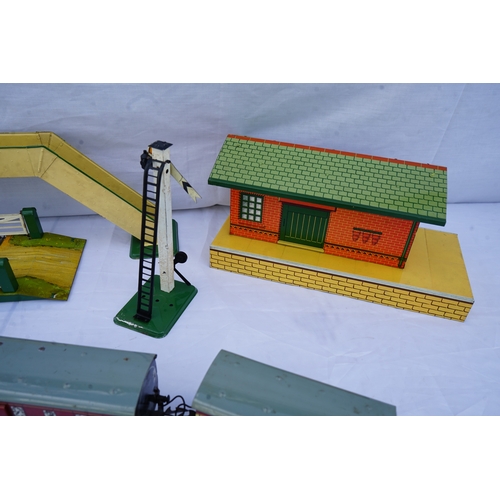 397 - Hornby: A collection of O Gauge Trains and Scenery Items . Each Piece is Individually Boxed in its o... 