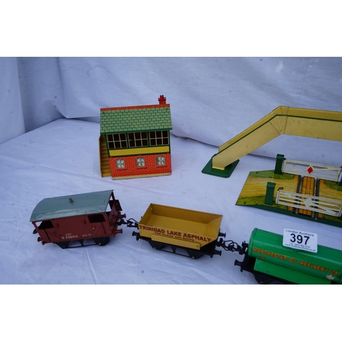 397 - Hornby: A collection of O Gauge Trains and Scenery Items . Each Piece is Individually Boxed in its o... 