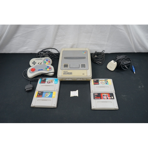 395A - Super Nintendo Games Console with 2 Controllers, Leads and 4 Games incl. Super Mario