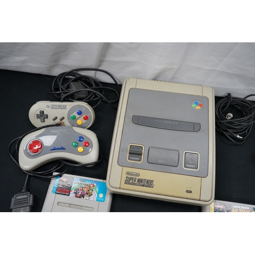 395A - Super Nintendo Games Console with 2 Controllers, Leads and 4 Games incl. Super Mario